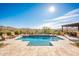 Inviting pool with expansive mountain views and a relaxing patio area at 32807 N 15Th Gln, Phoenix, AZ 85085