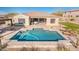 Relaxing pool with patio, loungers, and a view of the home at 32807 N 15Th Gln, Phoenix, AZ 85085