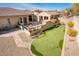 Elevated view of backyard putting green and patio at 32807 N 15Th Gln, Phoenix, AZ 85085