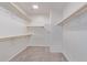 Large walk-in closet with ample shelving and hanging space at 35134 N Laredo Dr, San Tan Valley, AZ 85144