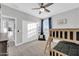 Cozy bedroom with bunk beds and a ceiling fan at 37762 N Poplar Rd, San Tan Valley, AZ 85140