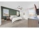 Main bedroom with green accent wall and ample closet space at 37762 N Poplar Rd, San Tan Valley, AZ 85140