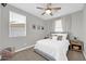 Guest bedroom with a ceiling fan, window blinds, and neutral decor at 37762 N Poplar Rd, San Tan Valley, AZ 85140