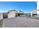 Detached garage with paver driveway and modern design at 37762 N Poplar Rd, San Tan Valley, AZ 85140