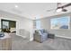 Loft with grey couch and view into main bedroom at 37762 N Poplar Rd, San Tan Valley, AZ 85140