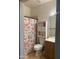 Bathroom with shower/tub combo and storage cabinet at 4043 E Arbor Ave, Mesa, AZ 85206