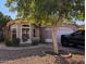 Single-story home with a landscaped yard and attached garage at 4043 E Arbor Ave, Mesa, AZ 85206