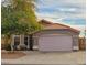 Charming single-story home featuring a tile roof, muted exterior paint and mature front-yard landscaping at 4043 E Arbor Ave, Mesa, AZ 85206