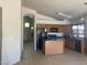 Eat-in kitchen with island and view into the living room at 4043 E Arbor Ave, Mesa, AZ 85206