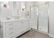 Bright bathroom with white vanity, a walk-in shower, and stylish fixtures at 42223 N Golden Trl, San Tan Valley, AZ 85140