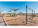 Playground with swings and shade structures at 42223 N Golden Trl, San Tan Valley, AZ 85140