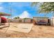 Large backyard with a storage shed and patio at 4405 W Clarendon Ave, Phoenix, AZ 85031