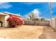 Backyard with a bougainvillea bush and patio at 4405 W Clarendon Ave, Phoenix, AZ 85031