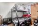 Bedroom with a bunk bed and an office chair at 4405 W Clarendon Ave, Phoenix, AZ 85031