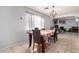 Bright dining area with a table, chairs, and a view into the living area at 4405 W Clarendon Ave, Phoenix, AZ 85031