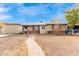 Ranch style home with walkway leading to the front door at 4405 W Clarendon Ave, Phoenix, AZ 85031