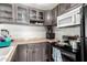 View of kitchen with stove, cabinets and counter space at 4405 W Clarendon Ave, Phoenix, AZ 85031