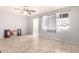 Bright living room with tile floors and ceiling fan at 4405 W Clarendon Ave, Phoenix, AZ 85031