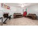 Cozy living room featuring a fireplace and tiled floors at 4405 W Clarendon Ave, Phoenix, AZ 85031