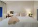 Spacious bedroom with a king-size bed and soft, neutral linens at 4432 E Camelback Rd # 120, Phoenix, AZ 85018