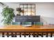 Farmhouse-style dining room with wooden table and green chairs at 4432 E Camelback Rd # 120, Phoenix, AZ 85018