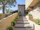 Inviting home exterior with landscaped walkway and stairs at 4432 E Camelback Rd # 120, Phoenix, AZ 85018