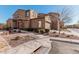 Two-story home with a stone accent and landscaping at 4777 S Fulton Ranch Blvd # 1027, Chandler, AZ 85248