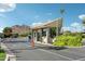 Community entrance gate featuring well-maintained landscaping and mountain views at 4800 N 68Th N St # 228, Scottsdale, AZ 85251