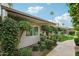 Street view of the property showcasing the well-maintained front yard and charming exterior at 4800 N 68Th N St # 228, Scottsdale, AZ 85251