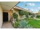 Close-up of the front entrance, with a welcoming facade and lush landscaping at 4800 N 68Th N St # 228, Scottsdale, AZ 85251