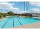 Large community swimming pool with clear blue water, lounge chairs, and mountain views at 4800 N 68Th N St # 228, Scottsdale, AZ 85251