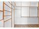 Large walk-in closet with ample shelving and hanging space at 4835 E Daley Ln, Phoenix, AZ 85054