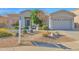 Single-story home with landscaped front yard and two-car garage at 4835 E Daley Ln, Phoenix, AZ 85054