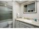 Bathroom with granite countertop, white cabinets, and a tub at 4850 E Desert Cove Ave # 132, Scottsdale, AZ 85254