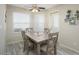 Dining area with gray wood-look floors and a window at 4850 E Desert Cove Ave # 132, Scottsdale, AZ 85254