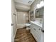 Clean bathroom, featuring a white vanity and shower/tub combo at 660 W 22Nd Ave, Apache Junction, AZ 85120