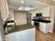 Modern kitchen with granite countertops and stainless steel appliances at 660 W 22Nd Ave, Apache Junction, AZ 85120