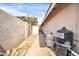 Side yard with pathway, storage shed and pool equipment at 7337 W Claremont St, Glendale, AZ 85303