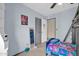 bedroom with bunk bed, built-in shelving and mirror at 7337 W Claremont St, Glendale, AZ 85303