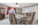 Bright dining room featuring a spacious table and wine rack at 7337 W Claremont St, Glendale, AZ 85303