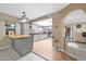 Kitchen features an island with butcher block countertop and gray cabinetry at 7337 W Claremont St, Glendale, AZ 85303