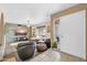 Spacious living room with stone accent wall and comfy seating at 7337 W Claremont St, Glendale, AZ 85303