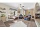 Relaxing living room with comfy seating and a large window at 7337 W Claremont St, Glendale, AZ 85303