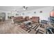 Living room with two brown sofas and a glass coffee table at 7337 W Claremont St, Glendale, AZ 85303