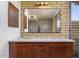 Bathroom with double vanity and mid-century modern cabinets at 7724 E Long Rifle Rd, Carefree, AZ 85377