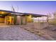 Mid-century modern home with desert landscaping and mountain views at 7724 E Long Rifle Rd, Carefree, AZ 85377