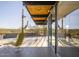 Mid-century modern patio with mountain view and chair at 7724 E Long Rifle Rd, Carefree, AZ 85377