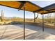 Mid-century modern patio with mountain views and covered area at 7724 E Long Rifle Rd, Carefree, AZ 85377