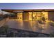 Spacious patio with seating area and mountain views at 7724 E Long Rifle Rd, Carefree, AZ 85377