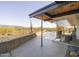 Mid-century modern patio with mountain views and covered area at 7724 E Long Rifle Rd, Carefree, AZ 85377